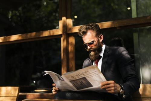 Man reading newspaper