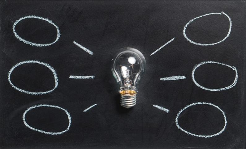 Lightbulb on background with circle ideas